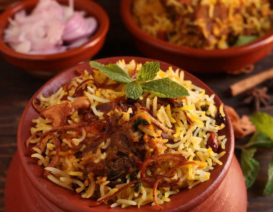 Clay-pot lamb biryani opened at the table