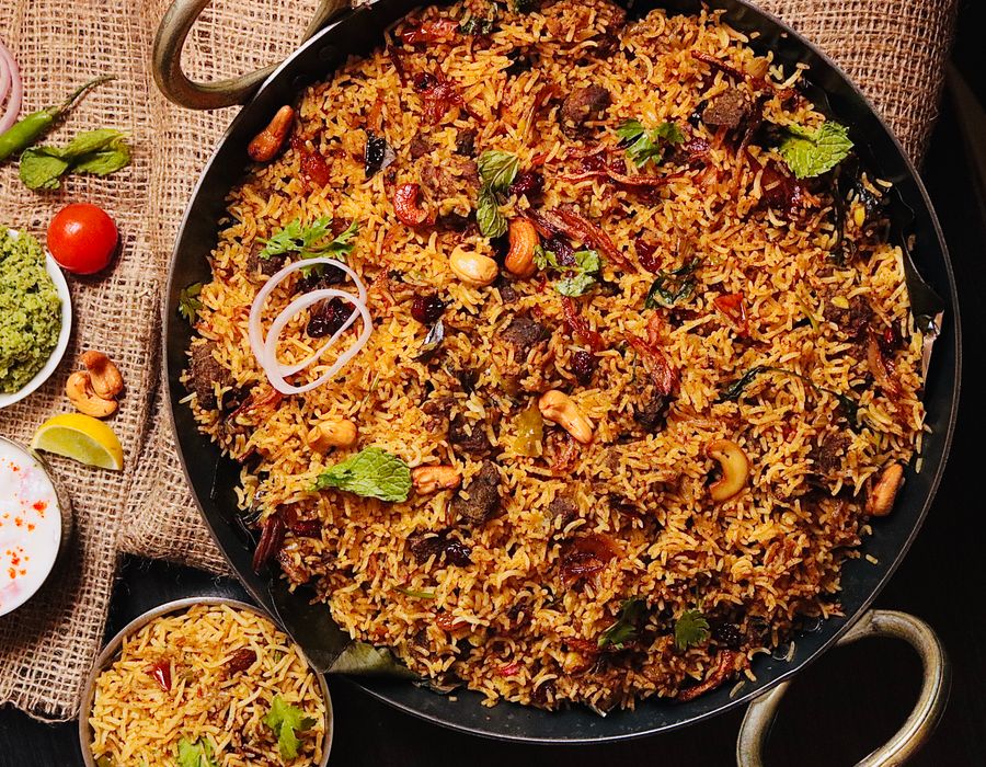 Biryani finished with cashew and herbs